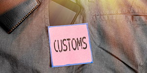 Conceptual hand writing showing Customs. Concept meaning Official department administers collects duties on imported goods Smartphone device inside trousers front pocket with wallet